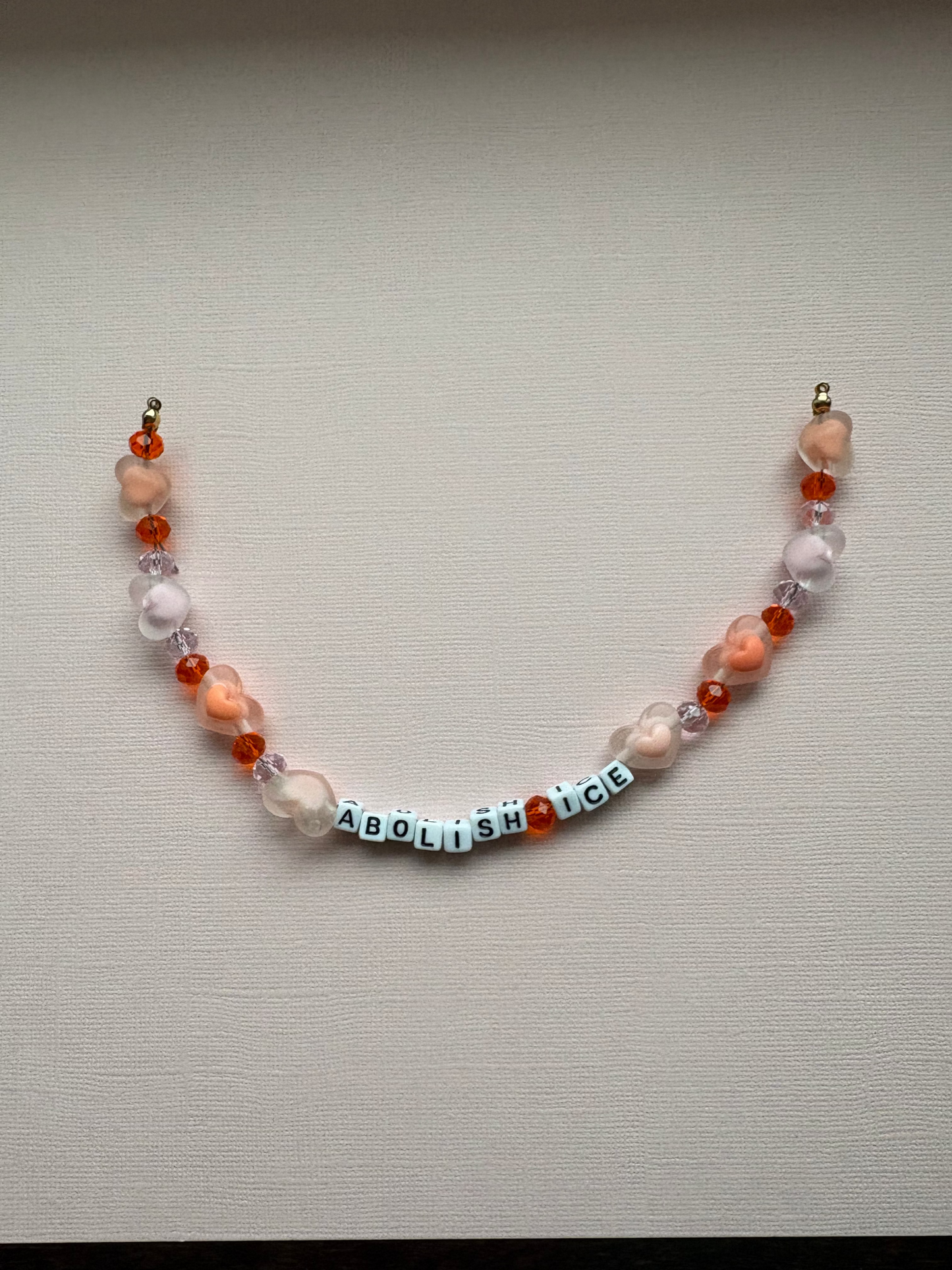 Abolish ICE pink/orange bag charm or phone charm