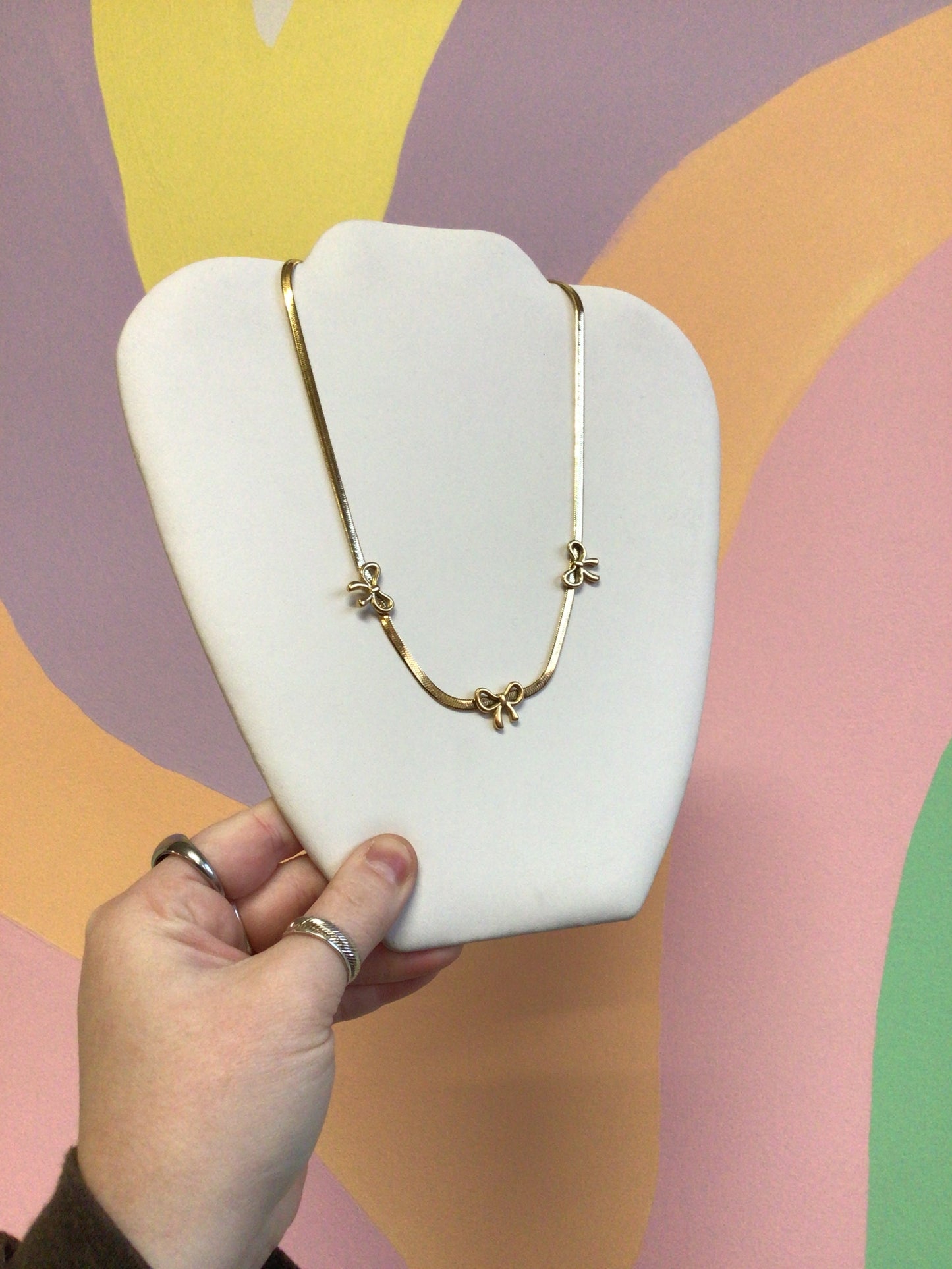Decked in Bows Titanium Necklace
