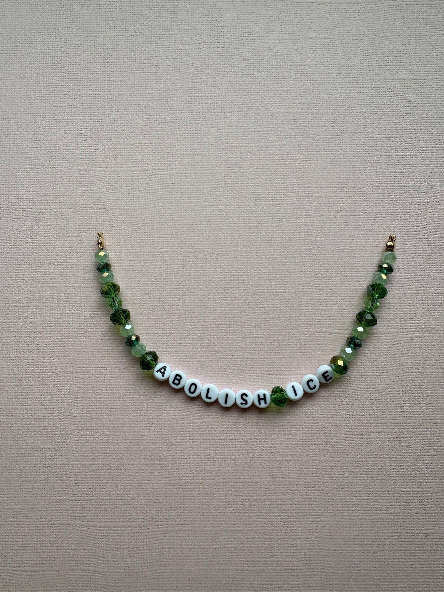 Abolish Ice green bracelet or bag charm