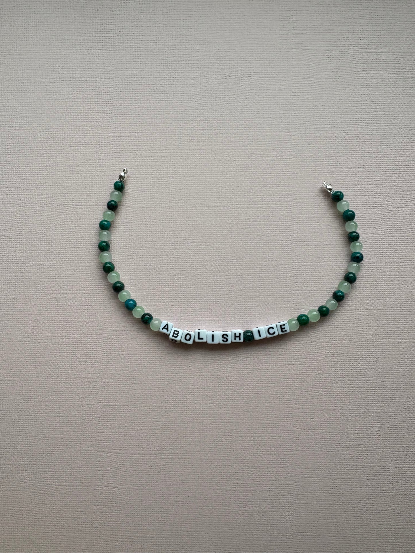 Abolish ICE green patterned bag charm or phone charm