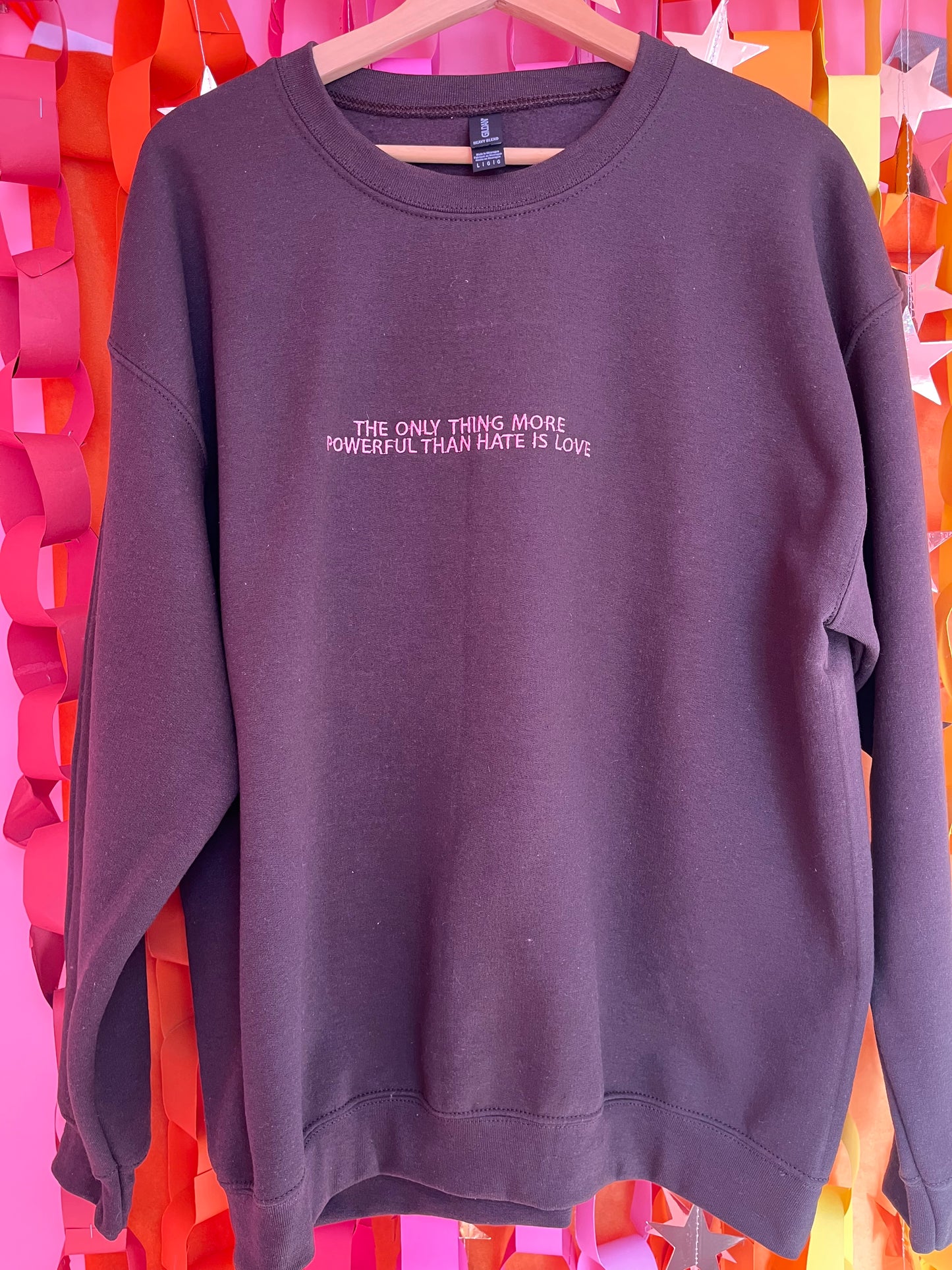 “The Only Thing More Powerful Than Love is Hate” Embroidered Shirt