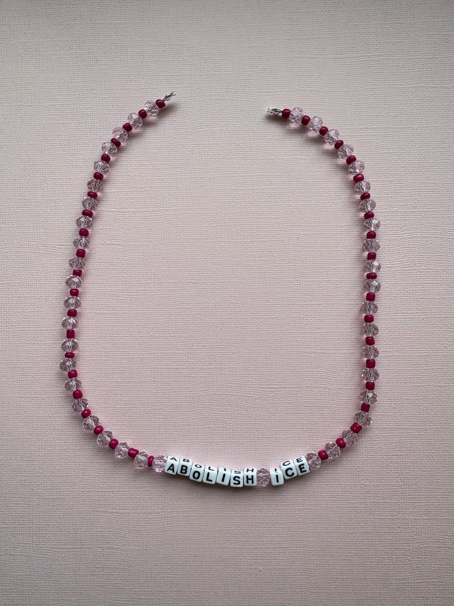 Abolish ICE Pink pattern necklace or bag charm