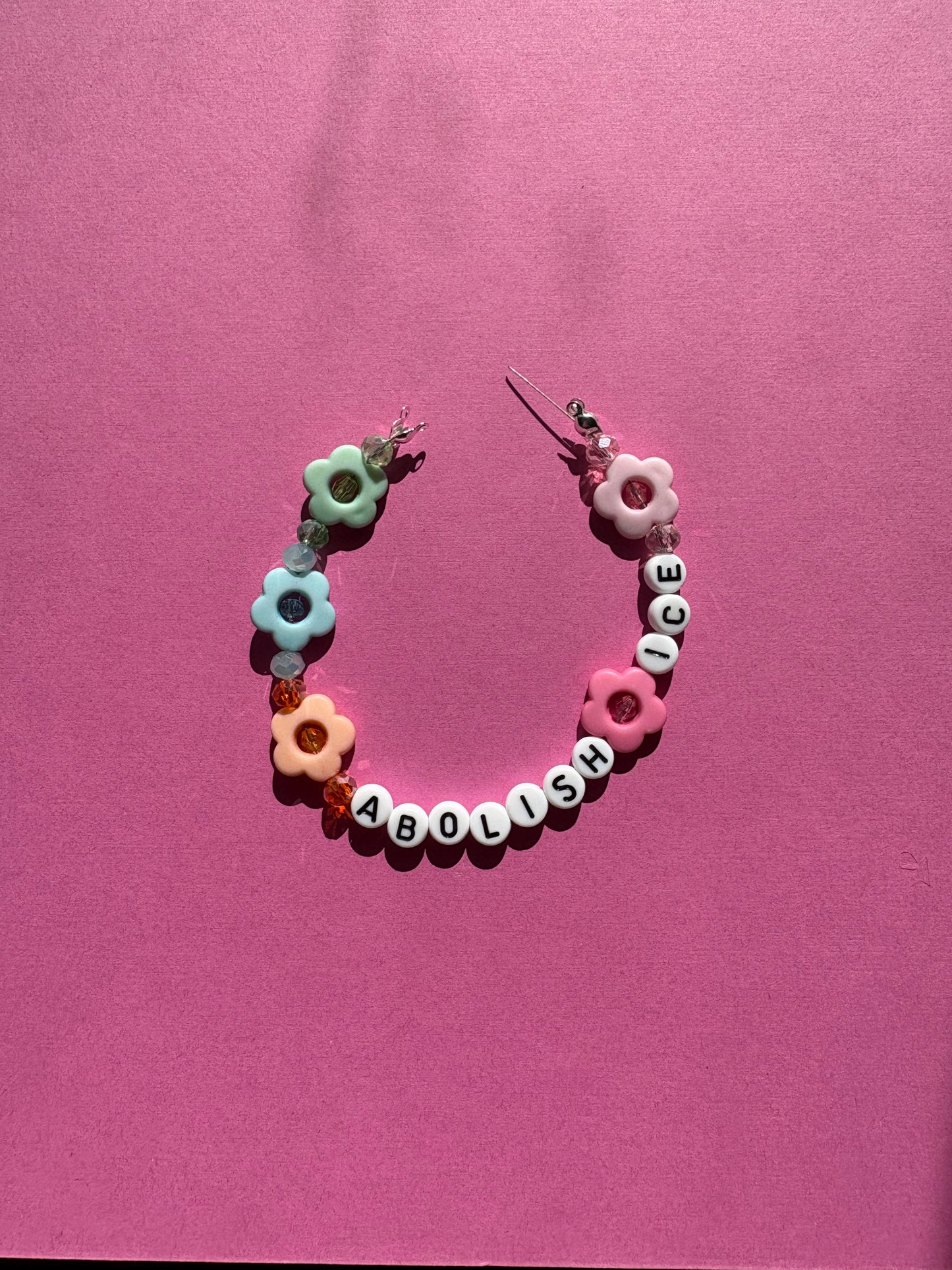 Abolish ICE colorful flowers bracelet or bag charm