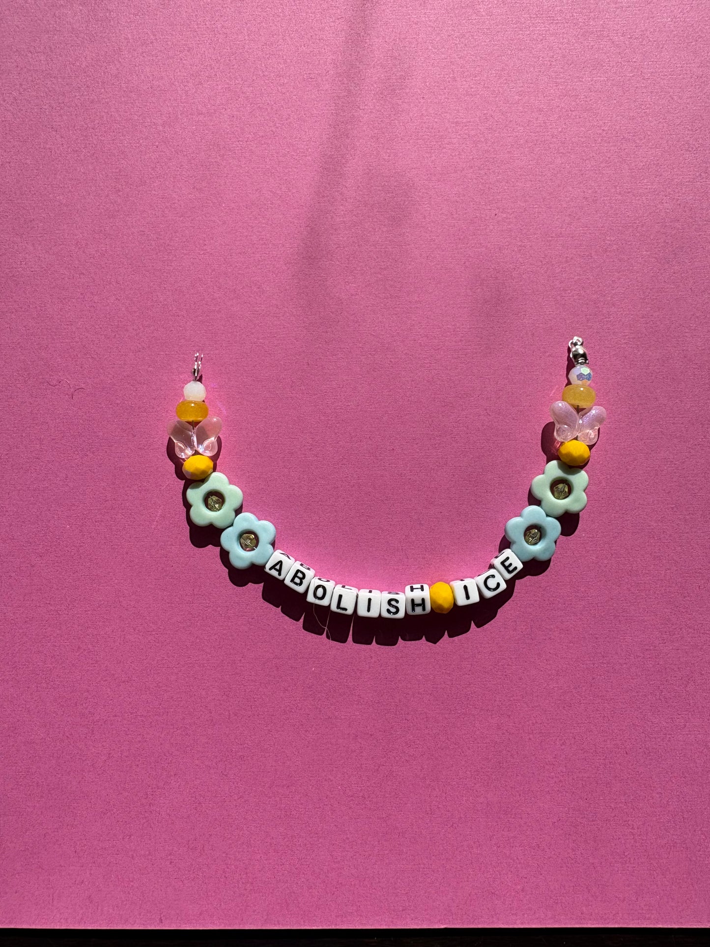 Abolish ICE pastel flower bag charm or bracelt