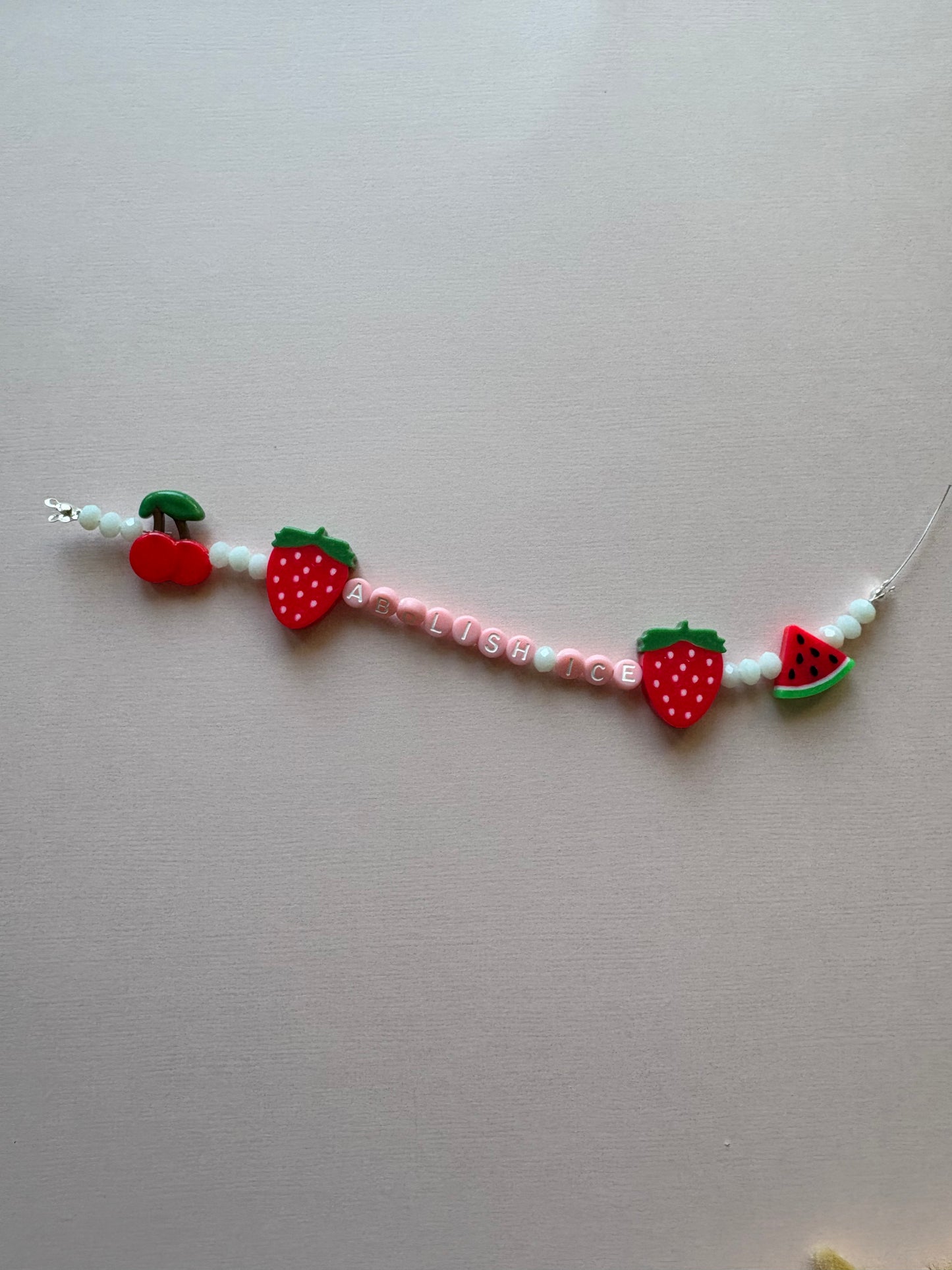 ABOLISH ICE fruit phone charm or bracelet
