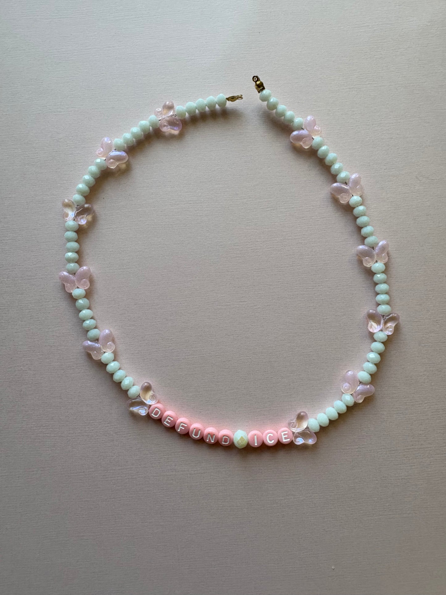 DEFUND ICE pink butterflies bag charm or necklace