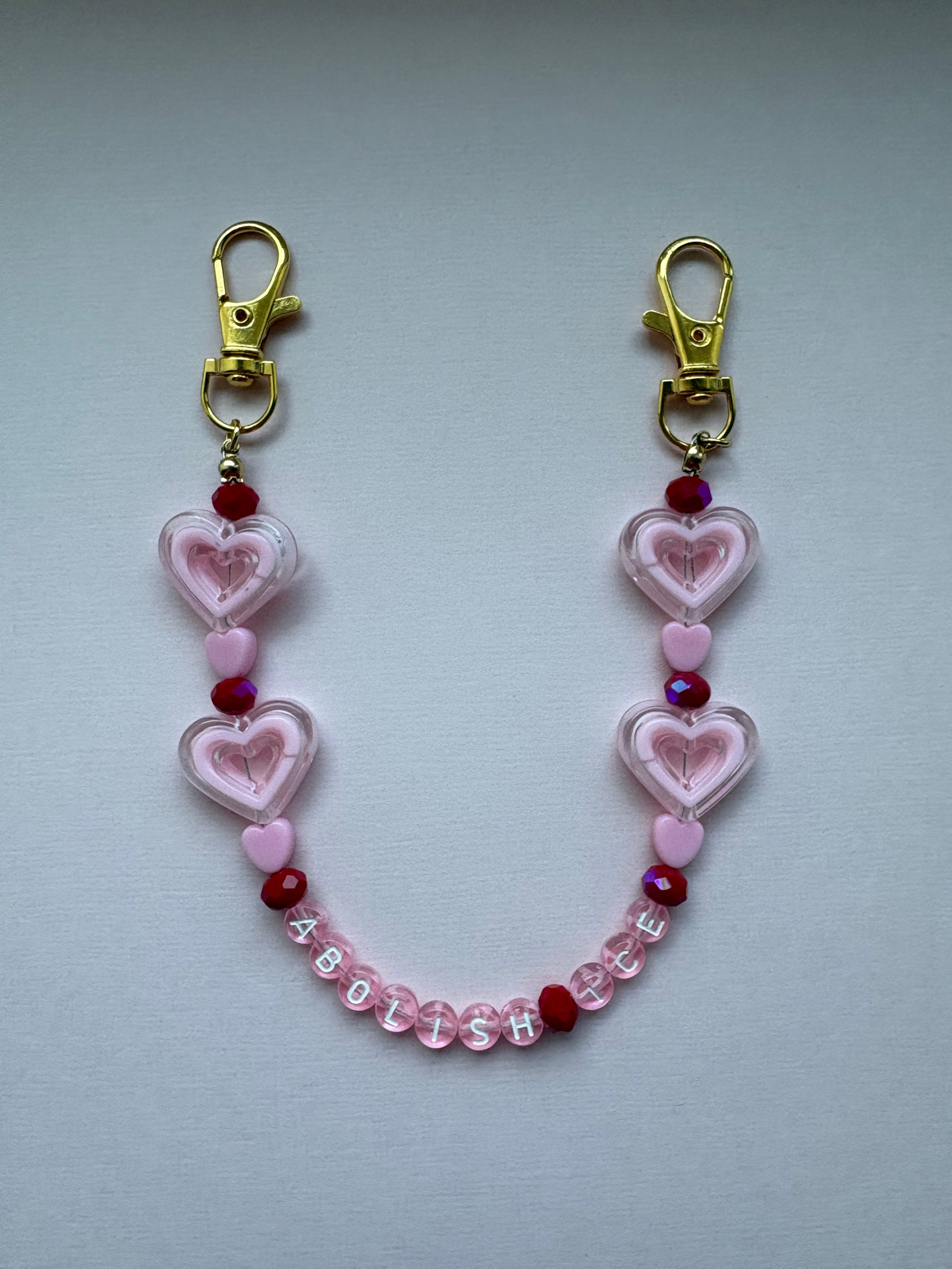 ABOLISH ICE pink heart bag charm
