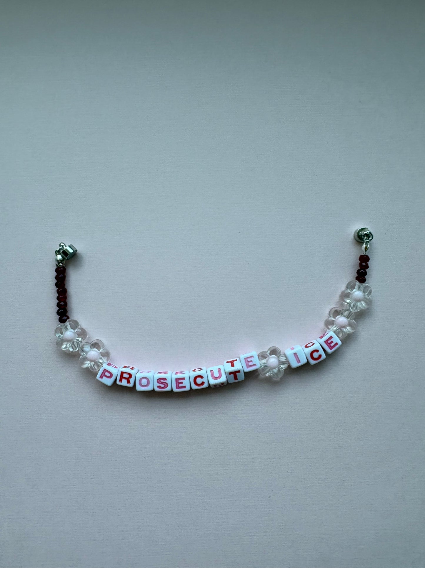 PROSECUTE ICE red and pink flower bracelet