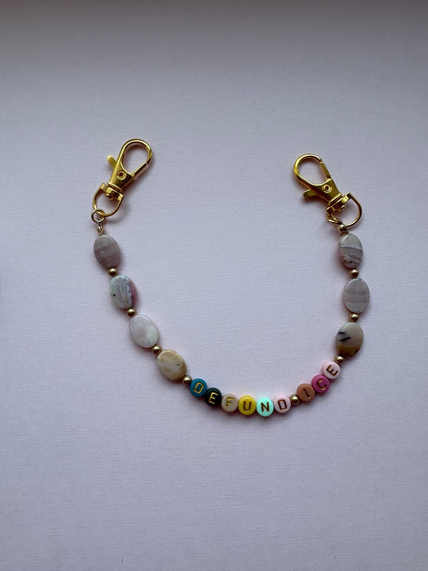 DEFUND ICE unique marble bag charm