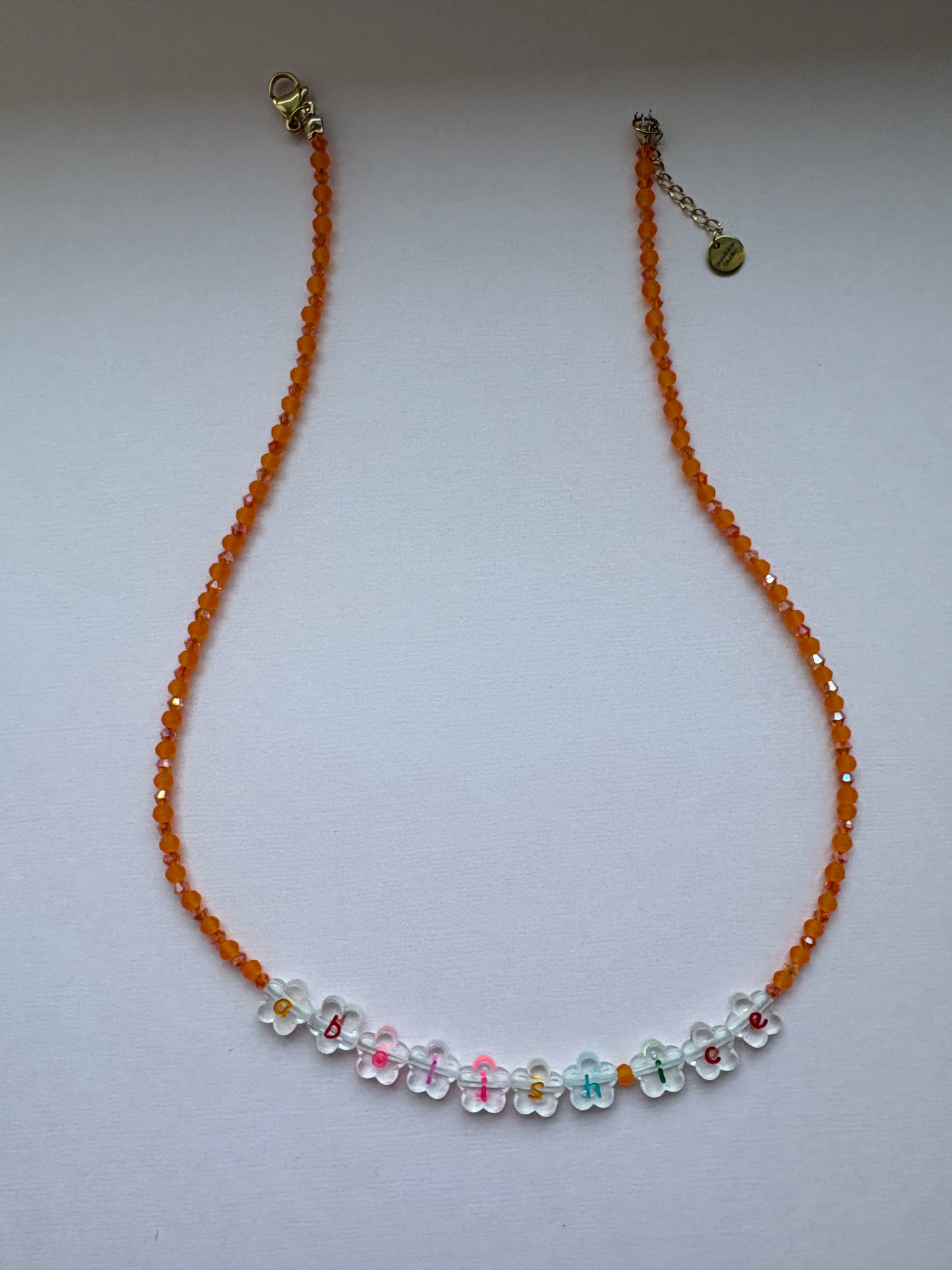 ABOLISH ICE orange patterned necklace