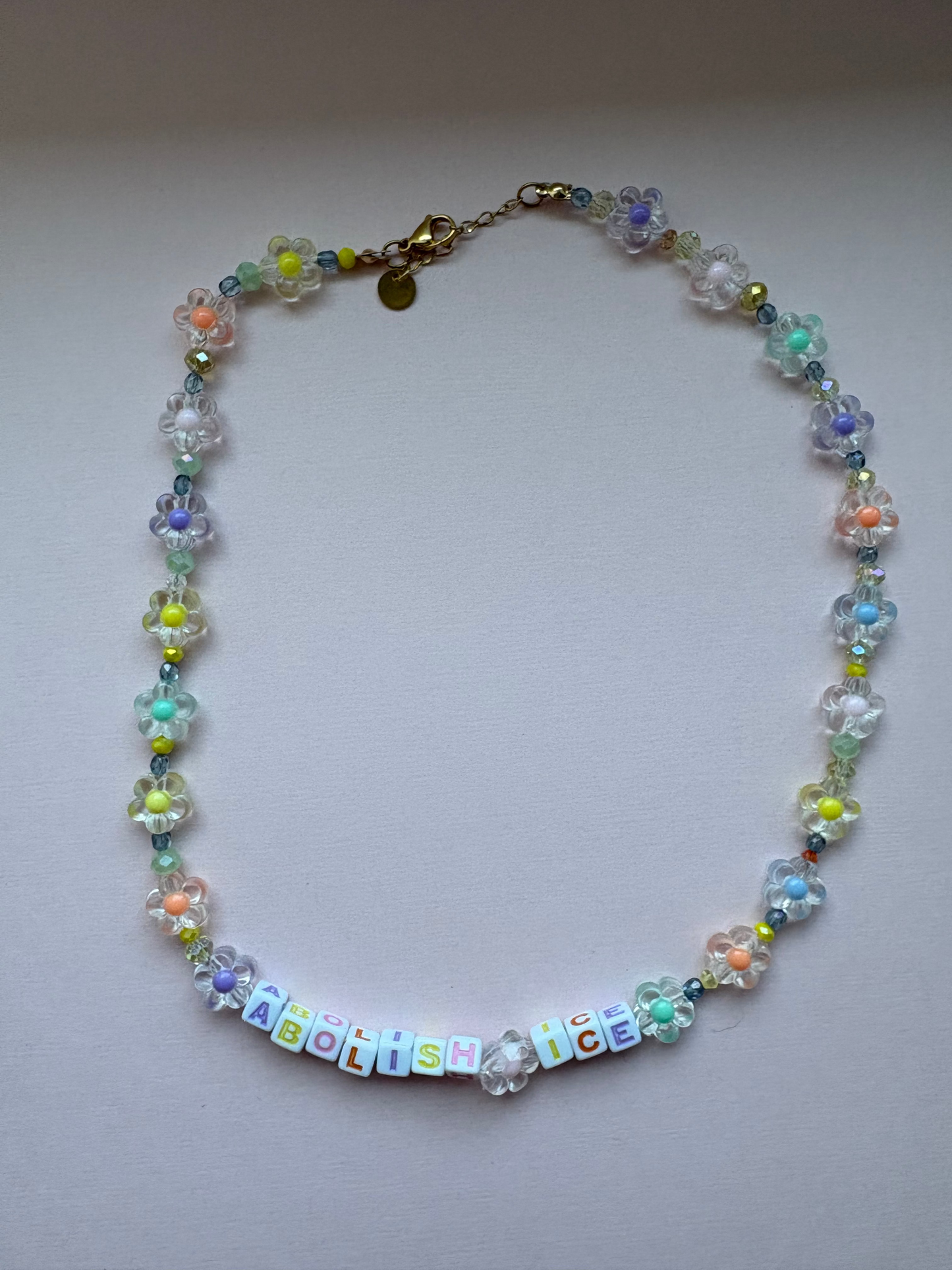 ABOLISH ICE pastel daisies necklace