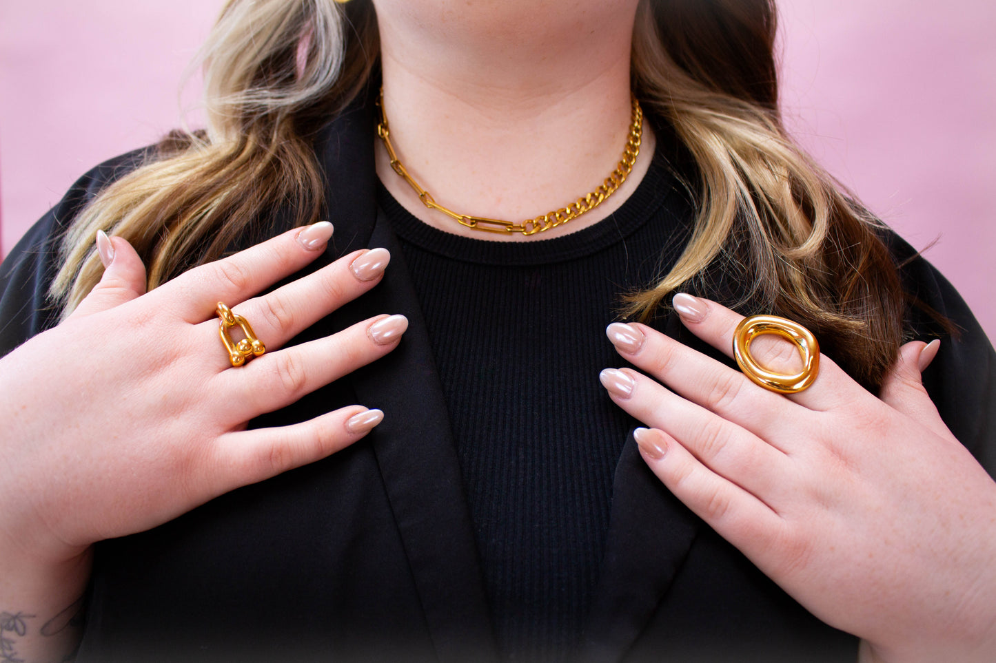 Titanium Chain-ge Up Necklace in gold shown on model's neck with hands in frame