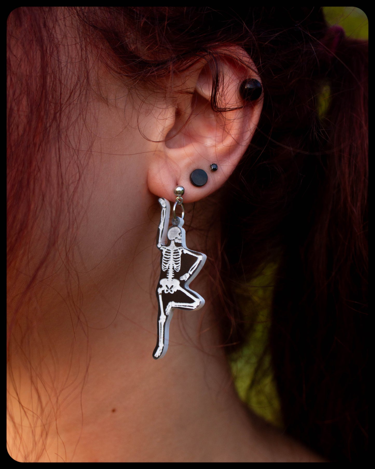 Stretching Skeleton Earrings