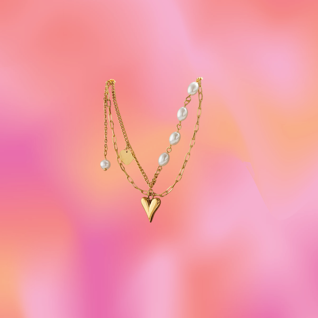 Dangly Layered Pearl and Titanium Necklace Product Photo in front of watercolor background