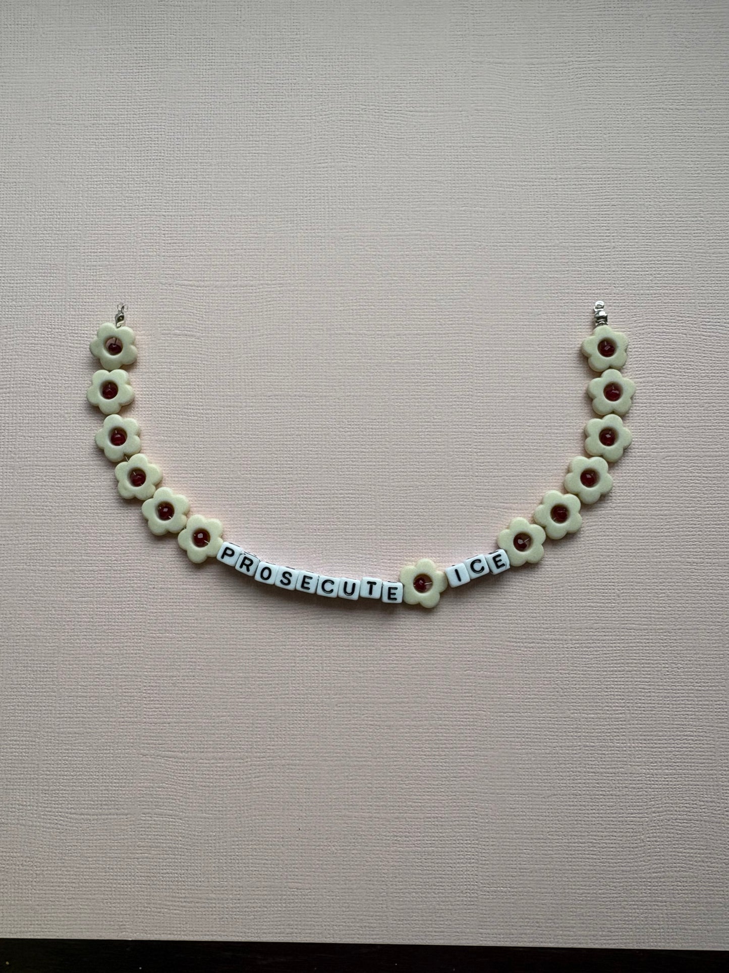 Prosecute ICE ivory flower bag charm or phone charm