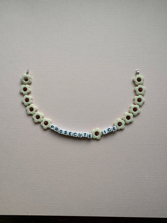 Prosecute ICE ivory flower bag charm or phone charm