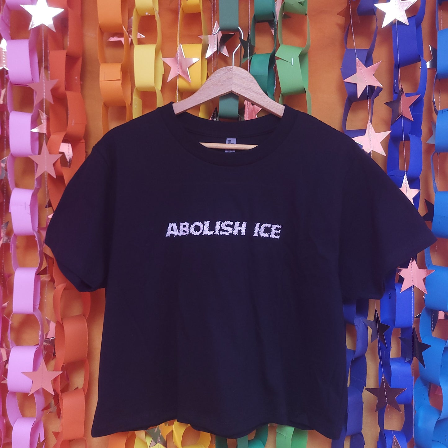 Fiery "Abolish ICE" Embroidered Top