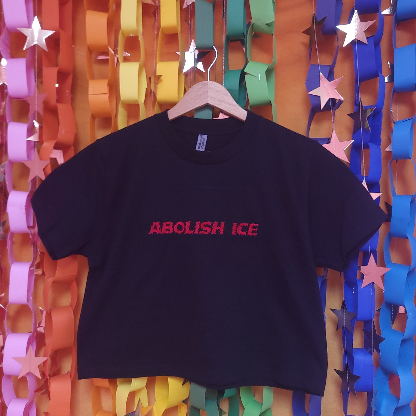 Fiery "Abolish ICE" Embroidered Top