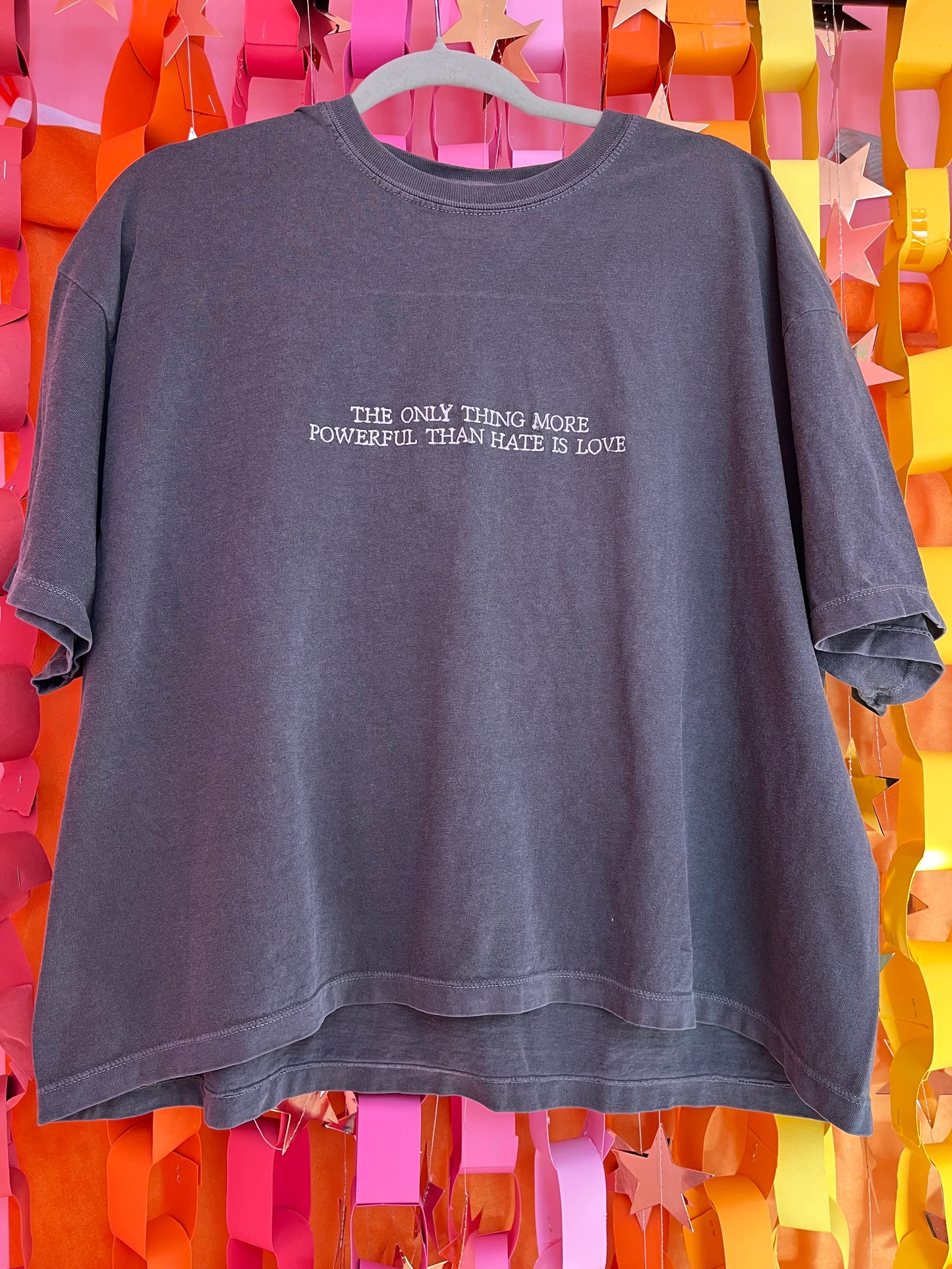 “The Only Thing More Powerful Than Love is Hate” Embroidered Shirt