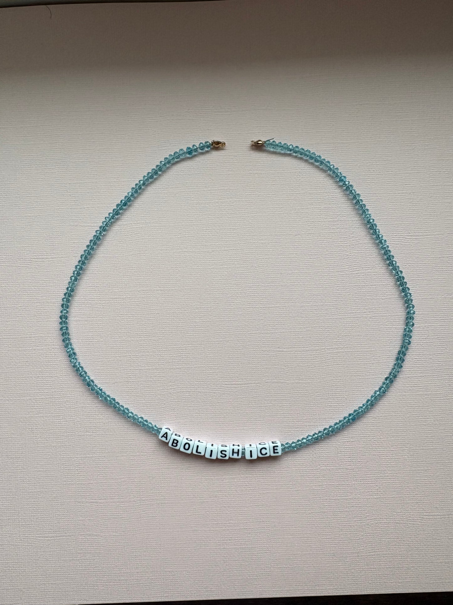 Abolish ICE Blue Beaded Necklace