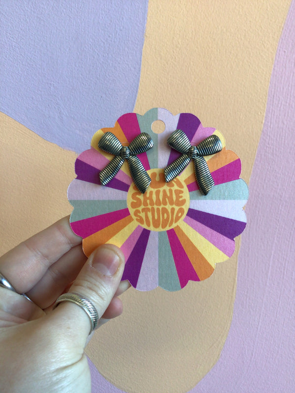 Titanium Stripped Bow Studs – Sunshine Studio