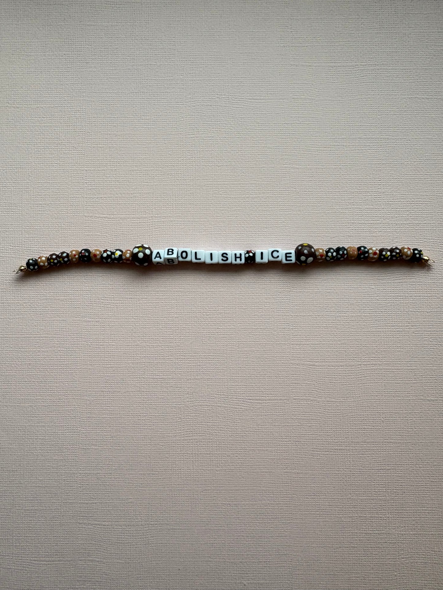 Abolish ICE wood beads bracelet or bag charm