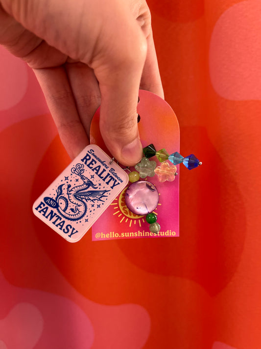 Between Reality and Fantasy Bag Charm