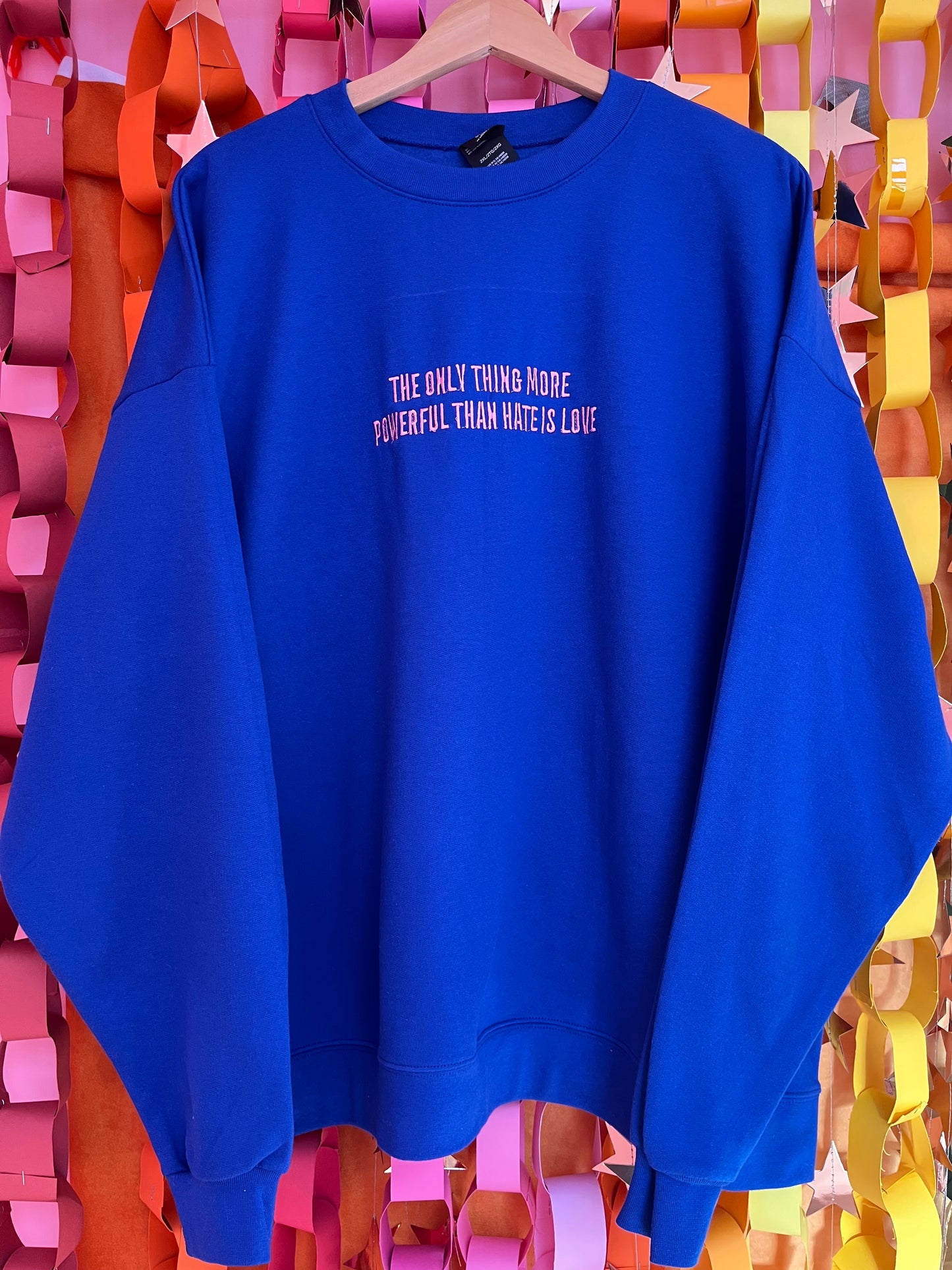“The Only Thing More Powerful Than Love is Hate” Embroidered Shirt