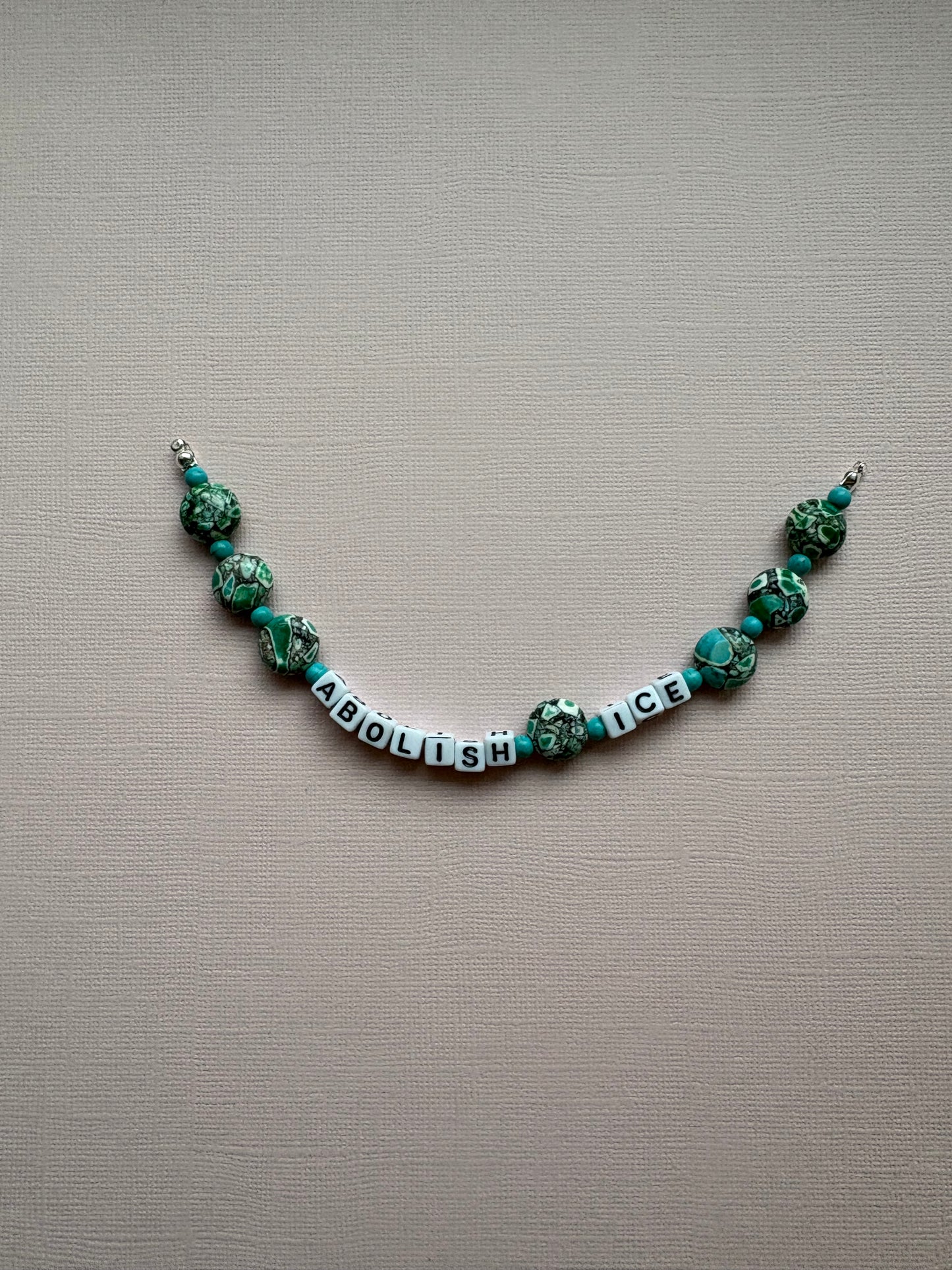 Abolish ICE turquoise patterned bracelet or bag charm