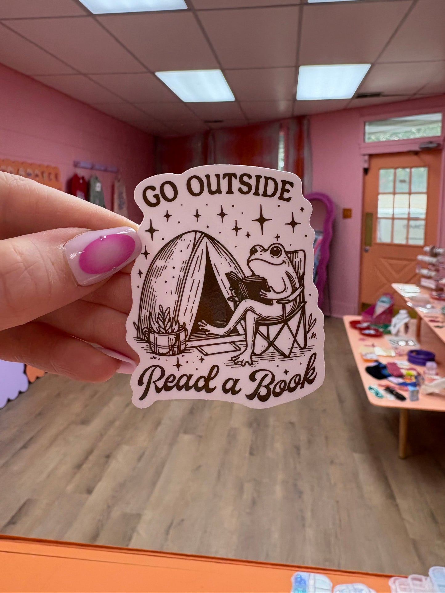 "Go Outside, Read a Book" frog Sticker
