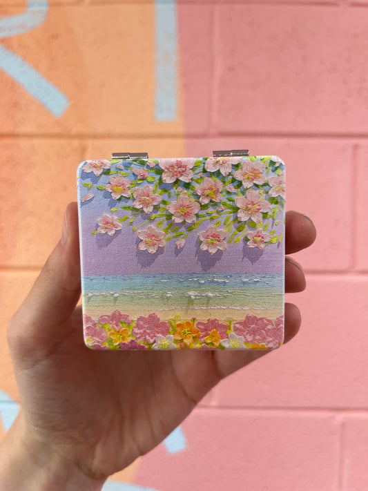 Tropical Compact Mirror