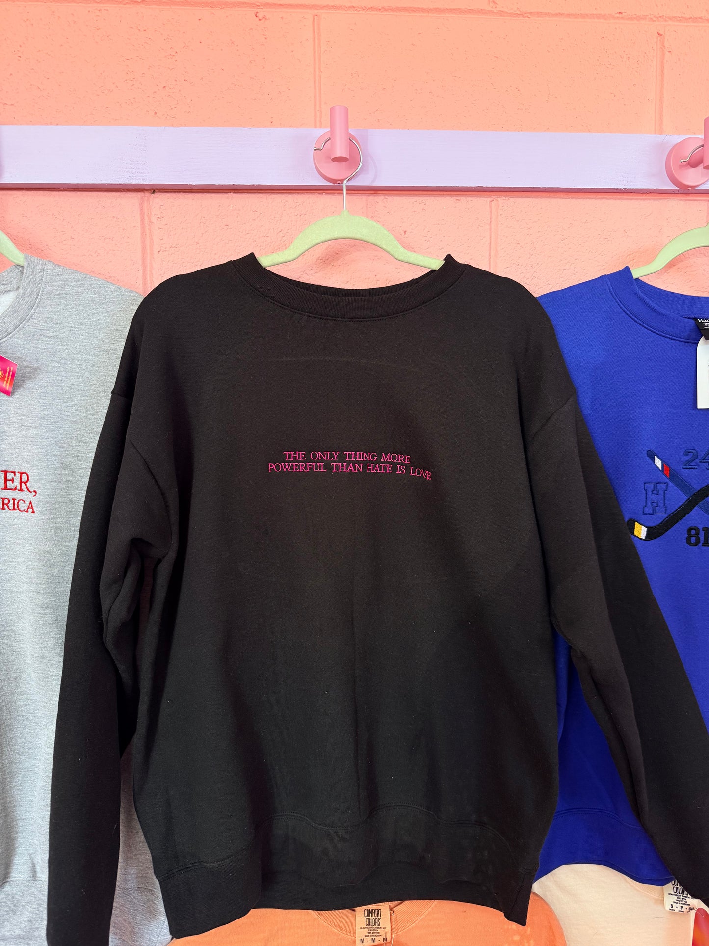 “The Only Thing More Powerful Than Love is Hate” Embroidered Shirt