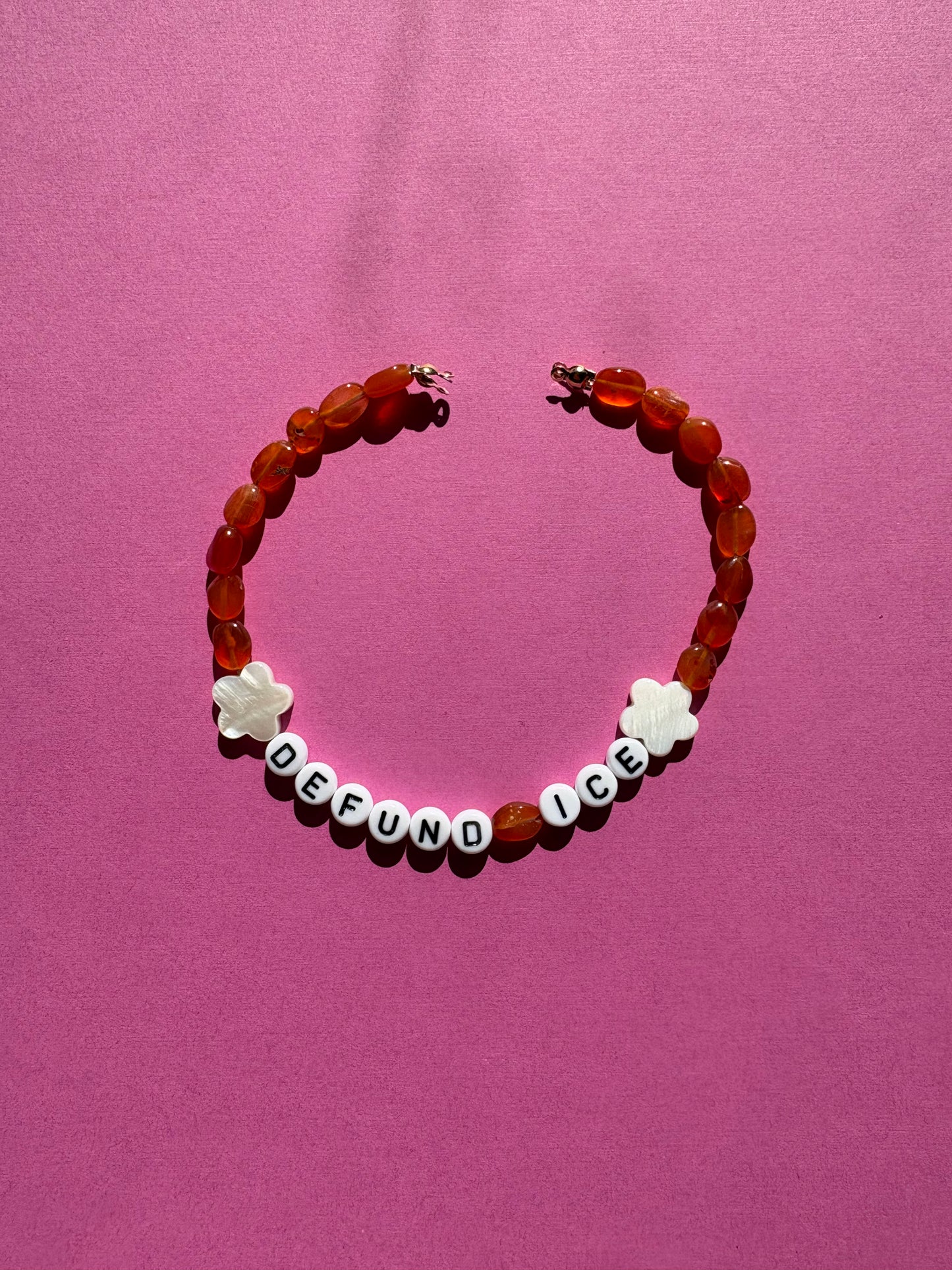 DEFUND ICE orange bead white flower