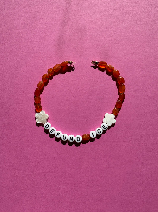 DEFUND ICE orange bead white flower