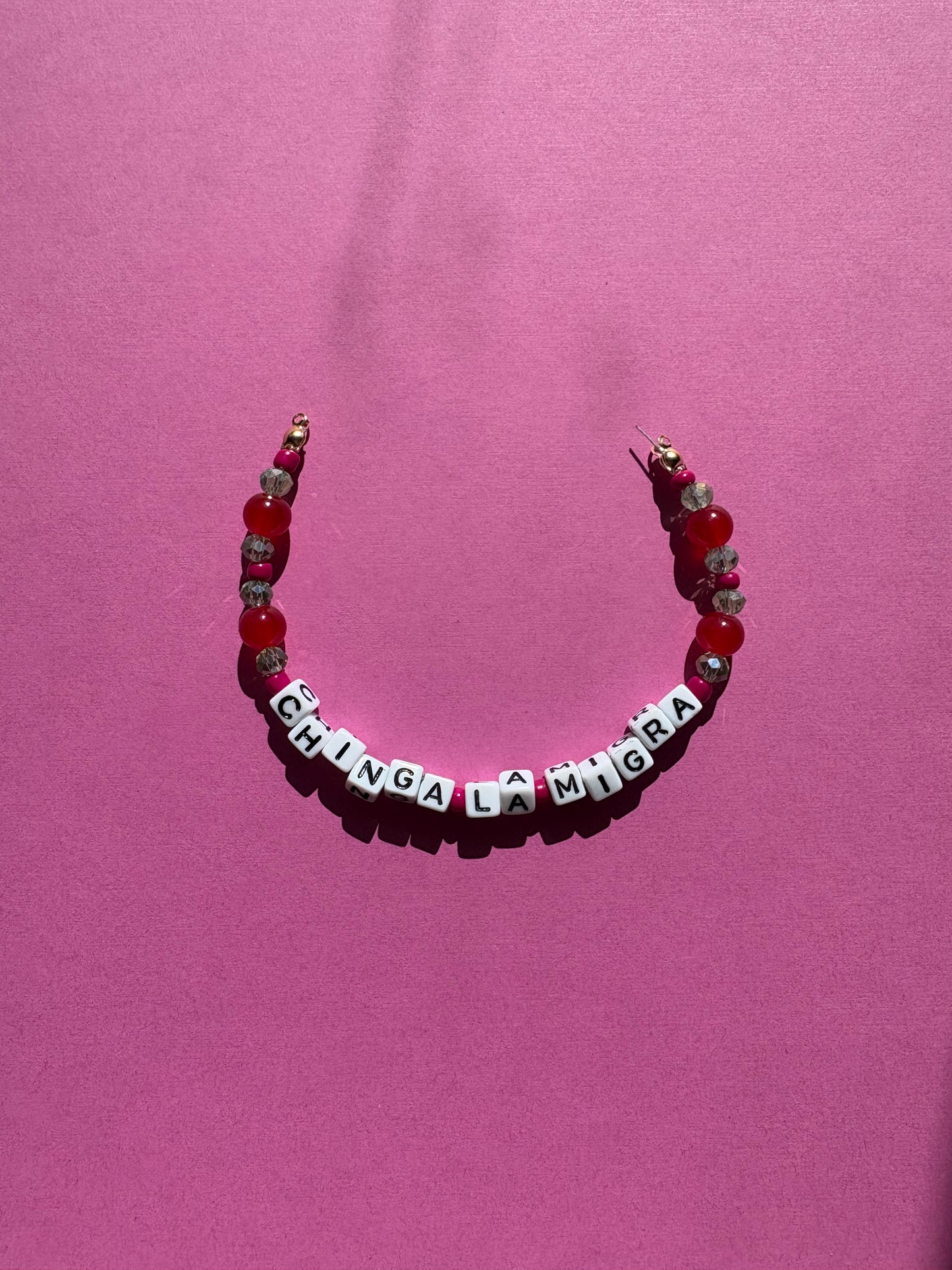 CHINGA LA MIGRA red beads