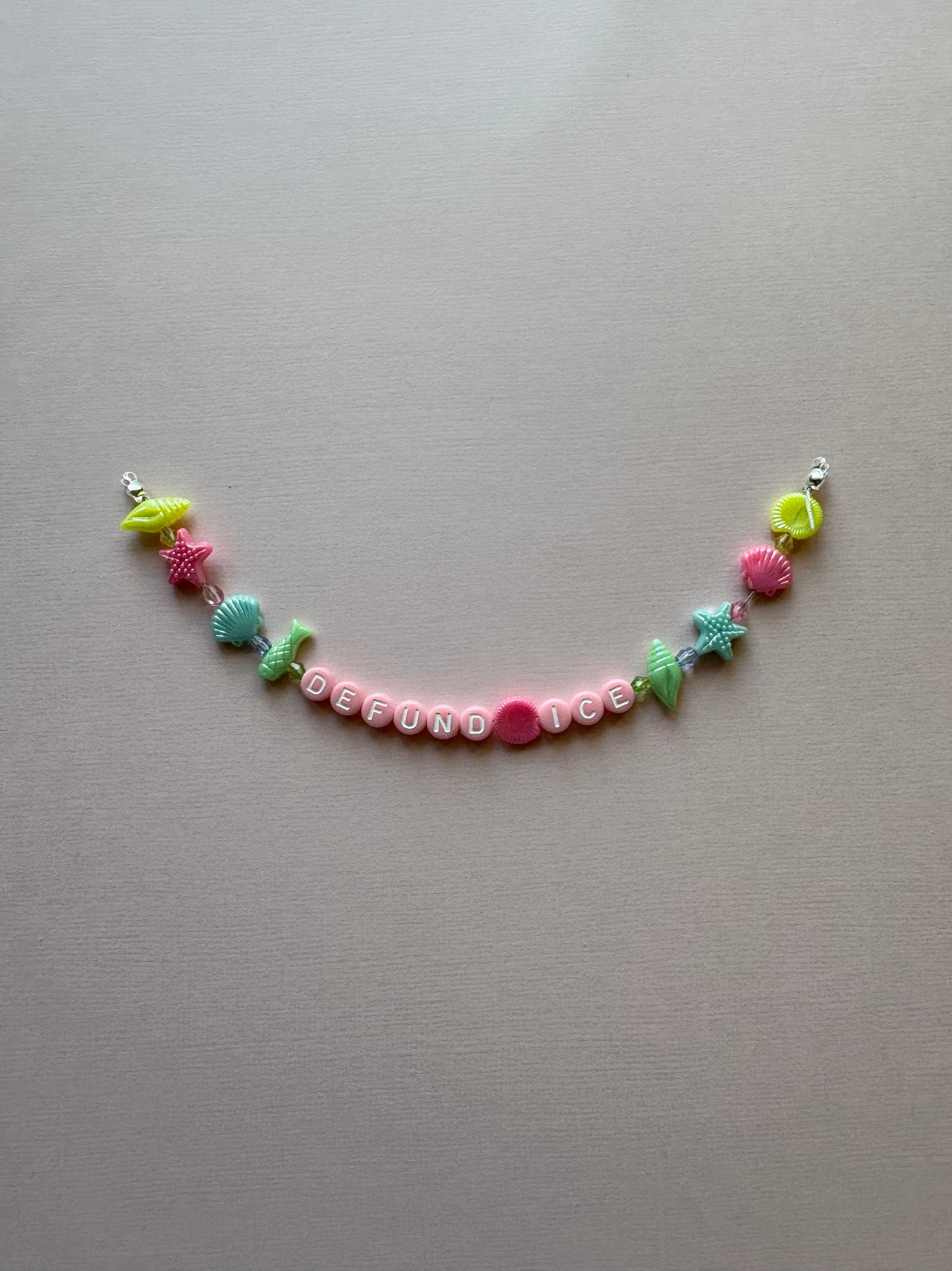 DEFUND ICE colorful fish phone charm or bracelet