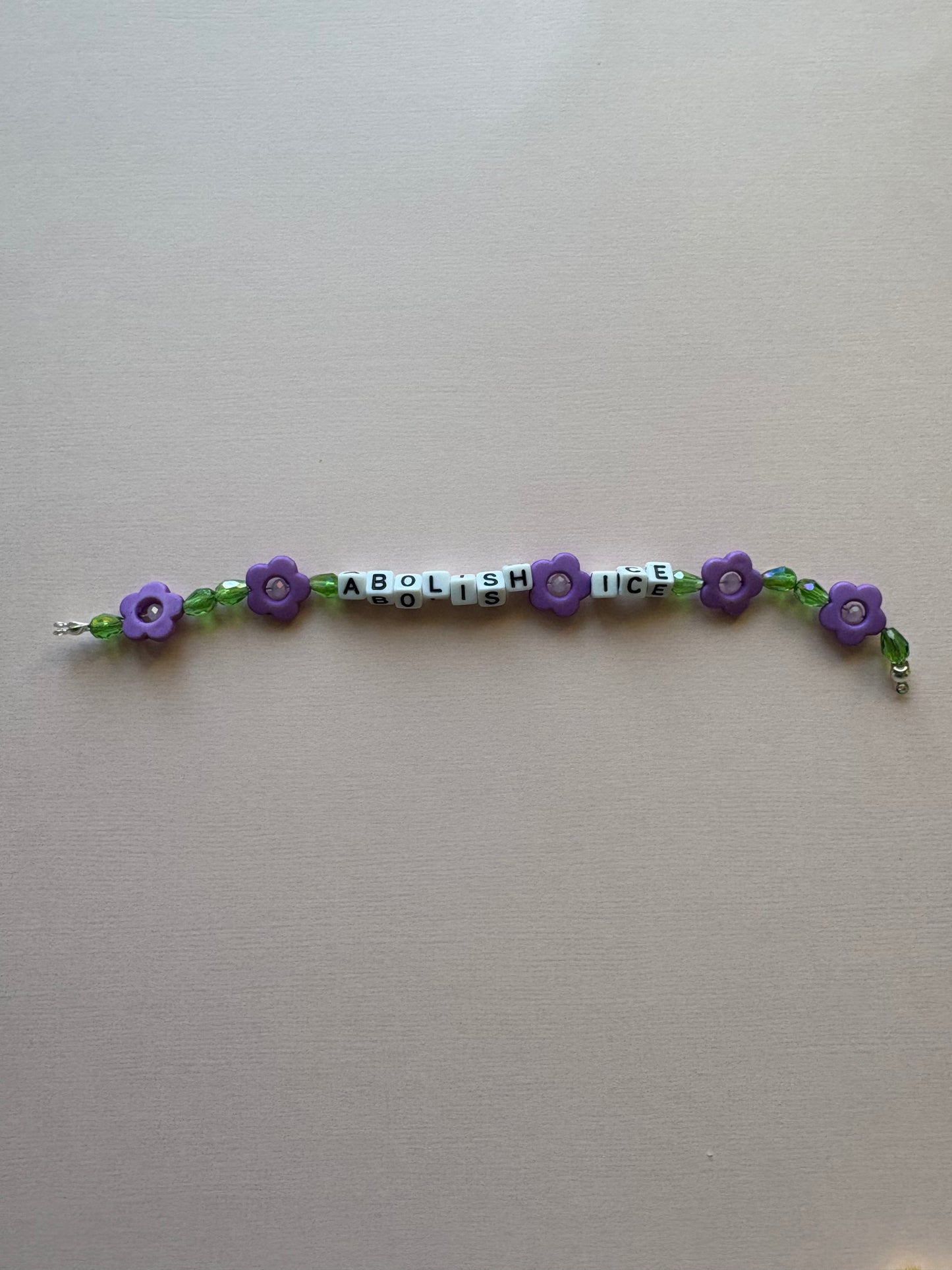 ABOLISH ICE purple flowers phone charm or bracelet