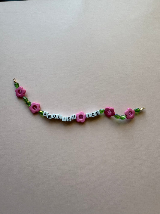 ABOLISH ICE pink flowers bracelet or phone charm