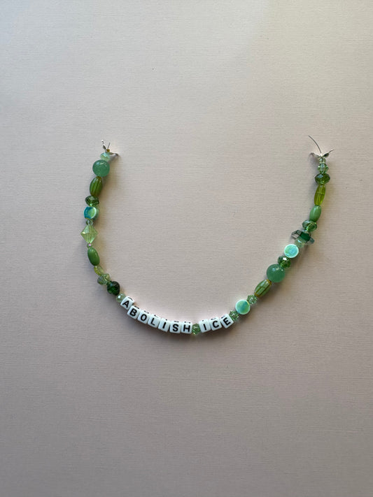 ABOLISH ICE green beaded bag or phone charm