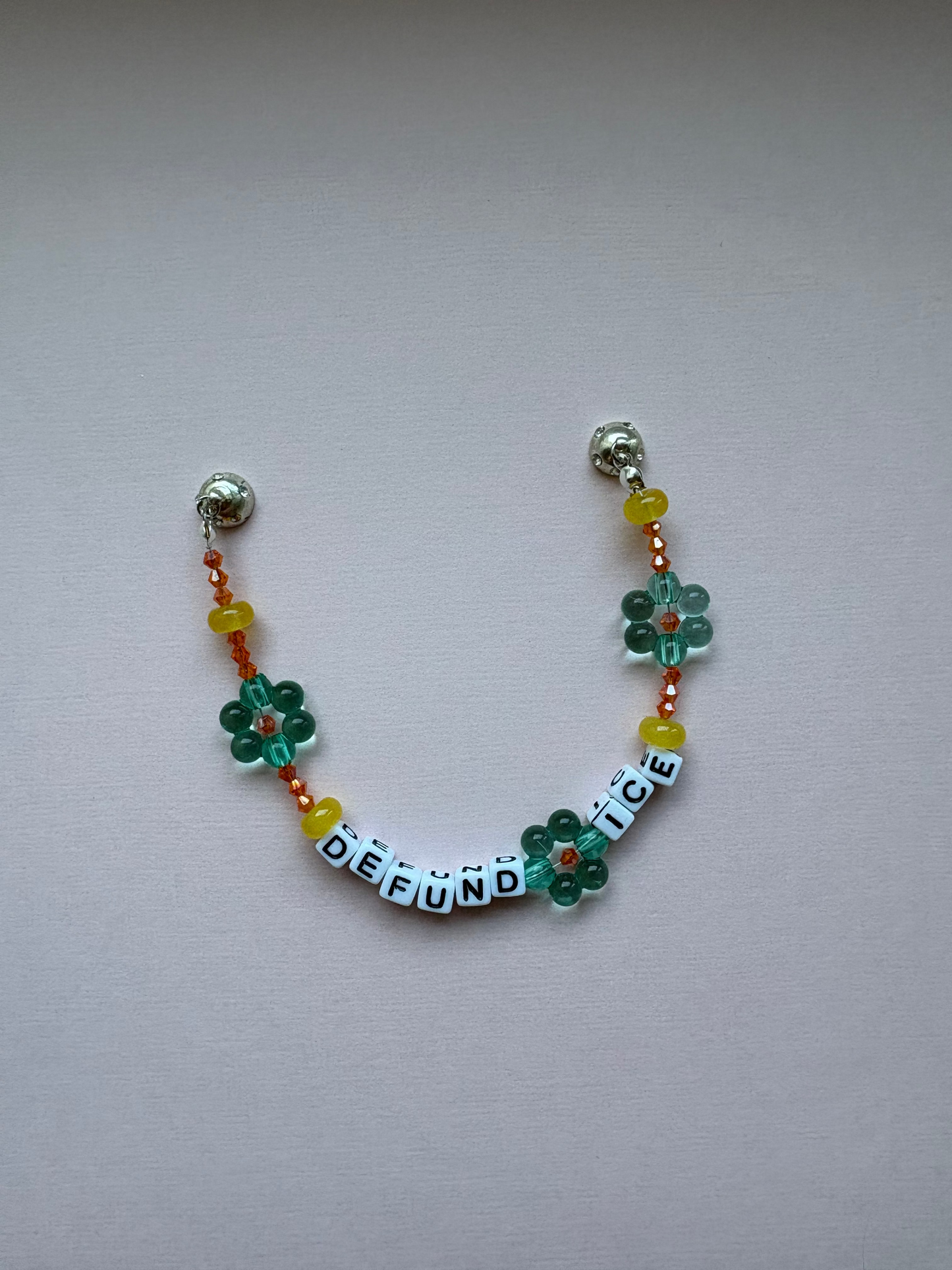 DEFUND ICE orange and teal retro flower bracelet