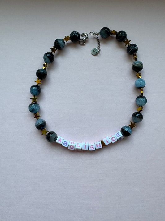 ABOLISH ICE globe and gold star necklace
