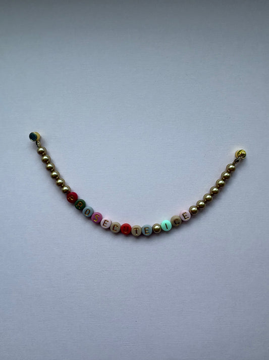 PROSECUTE ICE gold pearl bracelet